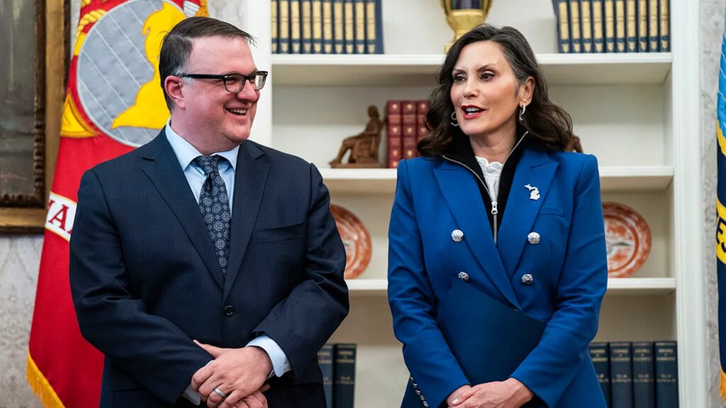Whitmer shields face with folder during Trump Oval Office meeting Whitmer shields face with folder during Trump Oval Office meeting