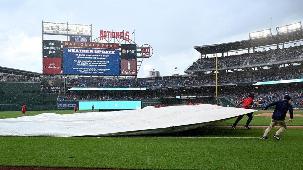 MLB News: Member of Nationals ground crew has close call with rain tarp