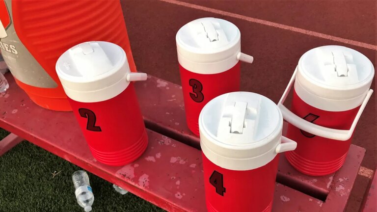 High school baseball player charged amid allegations of urinating in team’s water jug