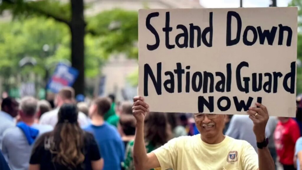 Immigration protests shadow Trump’s M military parade through Washington, DC