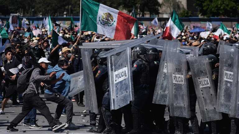 Mexico City protesters attack police in violent anti-government march