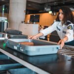 Online video going viral sparks heated debate over airport security bin stacking